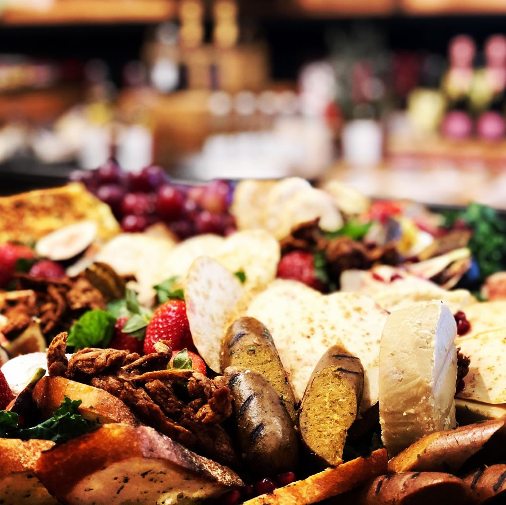 Hors d'oeuvres arranged on a slate platter